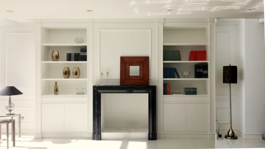 timeless libreria con camino progettata da Lo Cascio a Roma
